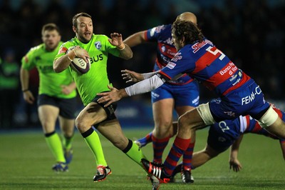 160115 - Cardiff Blues v Rovigo - European Rugby Challenge Cup - Gareth Davies of Cardiff Blues is tackled by Jean-Franois Montauriol of Rovigo