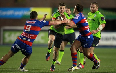 160115 - Cardiff Blues v Rovigo - European Rugby Challenge Cup - Gavin Evans of Cardiff Blues is tackled by Guglielmo Zanini and Denis Majstorovic of Rovigo