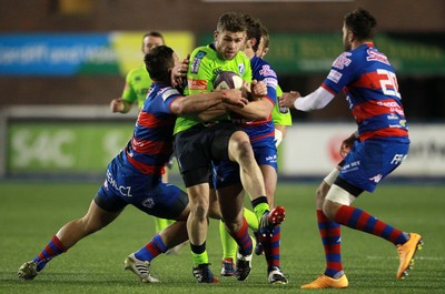 160115 - Cardiff Blues v Rovigo - European Rugby Challenge Cup - Gavin Evans of Cardiff Blues is tackled by Guglielmo Zanini and Denis Majstorovic of Rovigo