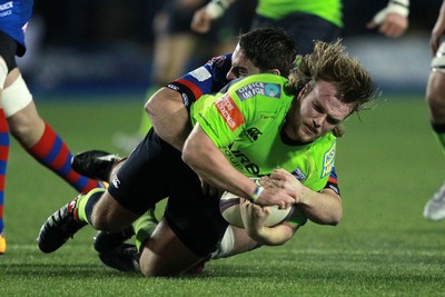 160115 - Cardiff Blues v Rovigo - European Rugby Challenge Cup - Kristian Dacey of Cardiff Blues is tackled by Matteo Maran of Rovigo