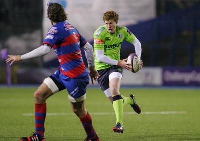 160115 - Cardiff Blues v FEMI-CZ Rugby Rovigo - European Rugby Challenge Cup -Rhys Patchell of The Blues takes on Jean Francois Montauriol of Rovigo