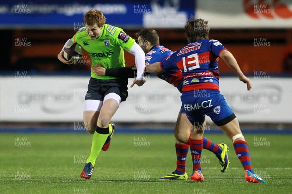 160115 - Cardiff Blues v Rovigo - European Rugby Challenge Cup - Rhys Patchell of Cardiff Blues is tackled by Peter Pavanello of Rovigo