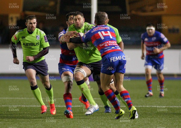 160115 - Cardiff Blues v FEMI-CZ Rugby Rovigo - European Rugby Challenge Cup -Chris Dicomidis of The Blues is tackled by Matteo Maran(L) and Peter Pavenello of Rovigo