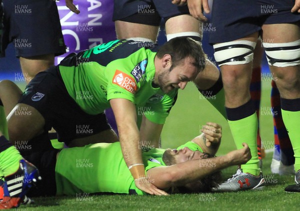 160115 - Cardiff Blues v FEMI-CZ Rugby Rovigo - European Rugby Challenge Cup -Lewis Jones of The Blues is congratulated by team mates as they reach 100 points