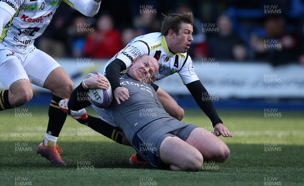 180120 - Cardiff Blues v Rugby Calvisano - European Rugby Challenge Cup - Dan Fish of Cardiff Blues is tackled by Kayle van Zyl of Calvisano