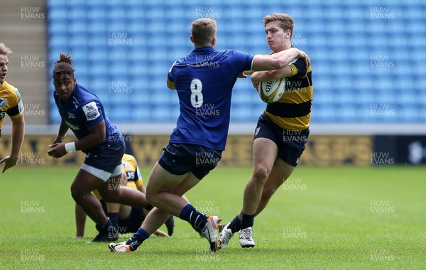 070816 - Singha Premiership Rugby 7s Series Final - Quarter Final - Cardiff Blues v Sale Sharks - Declan Williams of Cardiff Blues is tackled by Sam Bedlow of Sale