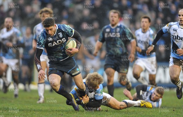 190113 - Cardiff Blues v Sale Sharks - Heineken Cup -Alex Cuthbert of Cardiff Blues is tackled by Charlie Amesbury of Sale