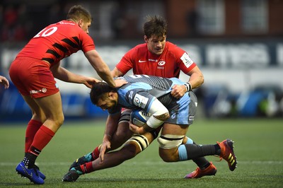 151218 - Cardiff Blues v Saracens - European Rugby Champions Cup - Josh Turnbull of Cardiff Blues is tackled by Michael Rhodes of Saracens