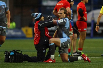 151218 - Cardiff Blues v Saracens - European Rugby Champions Cup - Kristian Dacey of Cardiff Blues receives treatment