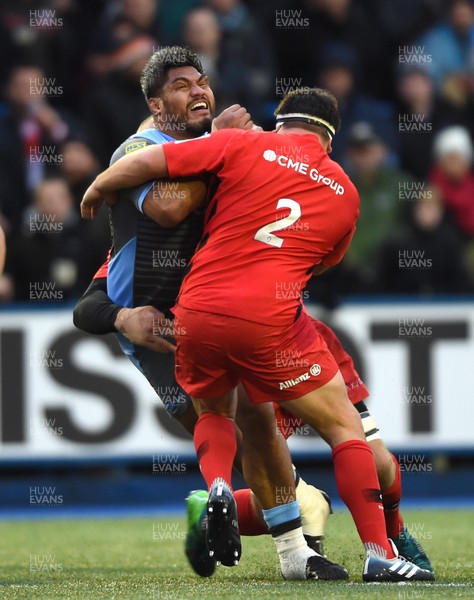 151218 - Cardiff Blues v Saracens - European Rugby Champions Cup - Nick Williams of Cardiff Blues is tackled by Jamie George of Saracens