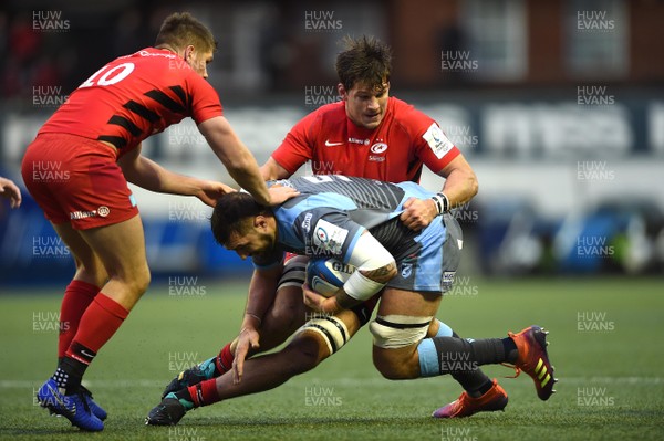 151218 - Cardiff Blues v Saracens - European Rugby Champions Cup - Josh Turnbull of Cardiff Blues is tackled by Michael Rhodes of Saracens