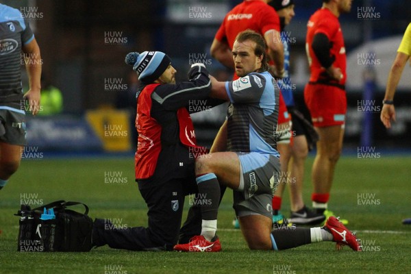 151218 - Cardiff Blues v Saracens - European Rugby Champions Cup - Kristian Dacey of Cardiff Blues receives treatment