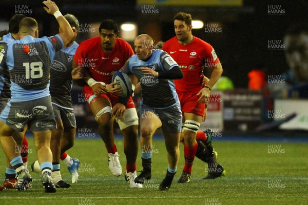 151218 - Cardiff Blues v Saracens - European Rugby Champions Cup - Dan Fish of Cardiff Blues is chased by Will Skelton of Saracens