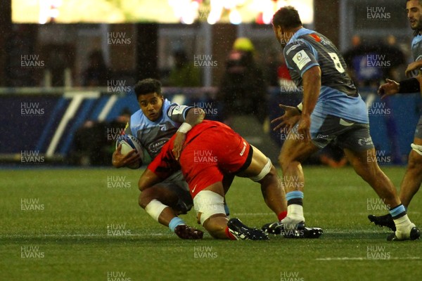 151218 - Cardiff Blues v Saracens - European Rugby Champions Cup - Rey Lee Lo of Cardiff Blues is tackled by Will Skelton of Saracens