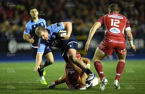 030120 - Cardiff Blues v Scarlets - Guinness PRO14 - Rhys Gill of Cardiff Blues is tackled by Josh Macleod of Scarlets