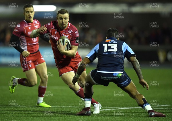 030120 - Cardiff Blues v Scarlets - Guinness PRO14 - Hadleigh Parkes of Scarlets takes on Rey Lee-Lo of Cardiff Blues
