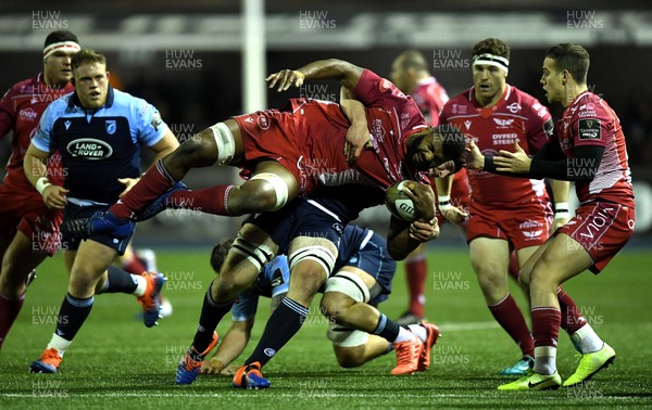 030120 - Cardiff Blues v Scarlets - Guinness PRO14 - Tevita Ratuva of Scarlets is tackled by James Ratti of Cardiff Blues