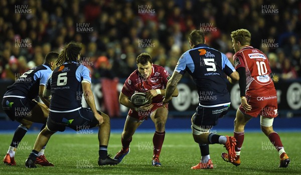 030120 - Cardiff Blues v Scarlets - Guinness PRO14 - Steff Hughes of Scarlets takes on Josh Turnbull of Cardiff Blues
