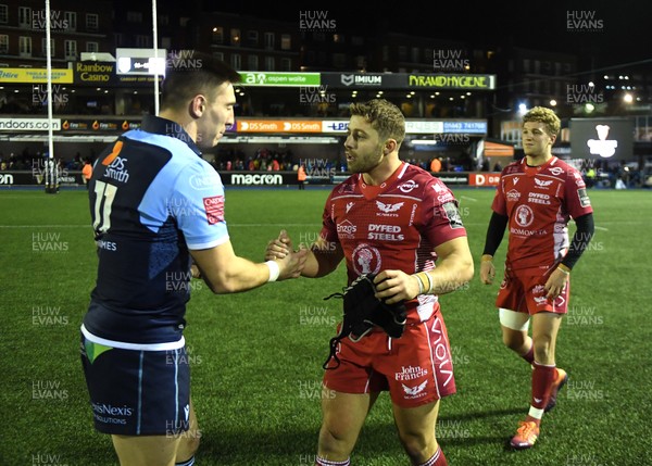 030120 - Cardiff Blues v Scarlets - Guinness PRO14 - Josh Adams of Cardiff Blues and Leigh Halfpenny of Scarlets at the end of the game