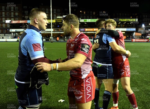 030120 - Cardiff Blues v Scarlets - Guinness PRO14 - Will Boyde of Cardiff Blues and Leigh Halfpenny of Scarlets at the end of the game
