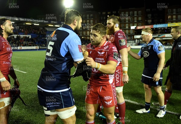 030120 - Cardiff Blues v Scarlets - Guinness PRO14 - Josh Turnbull of Cardiff Blues and Leigh Halfpenny of Scarlets at the end of the game