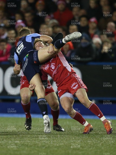 030120 - Cardiff Blues v Scarlets, Guinness PRO14 - Angus O’Brien of Scarlets tackles Hallam Amos of Cardiff Blues