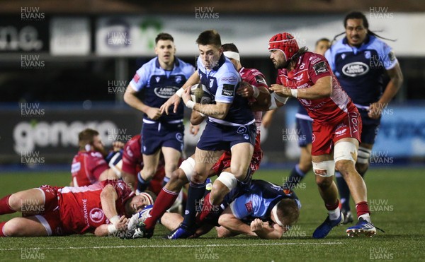 030120 - Cardiff Blues v Scarlets, Guinness PRO14 - Josh Adams of Cardiff Blues is tackled by Aaron Shingler of Scarlets