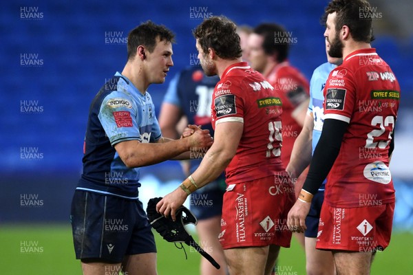 090121 - Cardiff Blues v Scarlets - Guinness PRO14 - Jarrod Evans of Cardiff Blues and Leigh Halfpenny of Scarlets at the end of the game