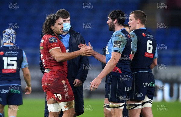 090121 - Cardiff Blues v Scarlets - Guinness PRO14 - Josh Macleod of Scarlets and Cory Hill of Cardiff Blues at the end of the game