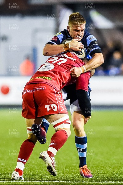220319 - Cardiff Blues v Scarlets, Guinness PRO14 - Gareth Anscombe of Cardiff Blues is blocked 