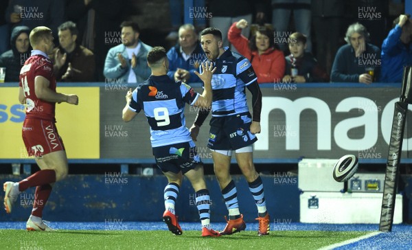 220319 - Cardiff Blues v Scarlets - Guinness PRO14 - Aled Summerhill of Cardiff Blues celebrates scoring try with Tomas Williams (left)