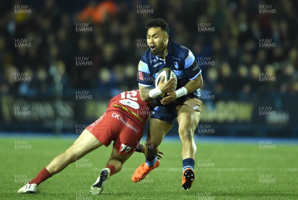 220319 - Cardiff Blues v Scarlets - Guinness PRO14 - Willis Halaholo of Cardiff Blues is tackled by Paul Asquith of Scarlets