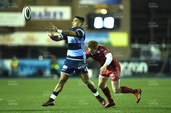 220319 - Cardiff Blues v Scarlets - Guinness PRO14 - Rey Lee-Lo of Cardiff Blues is tackled by Rhys Patchell of Scarlets