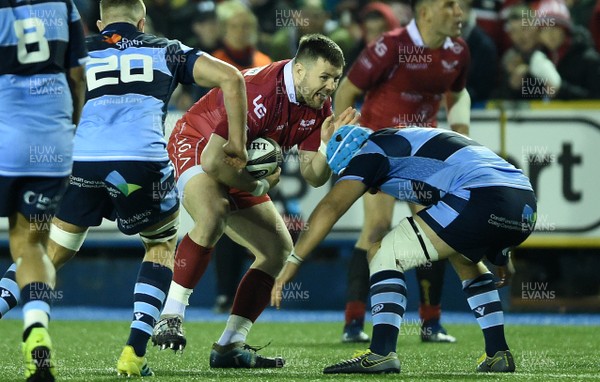 220319 - Cardiff Blues v Scarlets - Guinness PRO14 - Rob Evans of Scarlets takes on Olly Robinson of Cardiff Blues