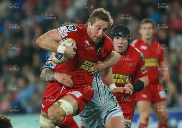 240312 Cardiff Blues v Scarlets - RaboDirect PRO 12 -Scarlets' Dominc Day is tackled by Blues' Ryan Tyrell