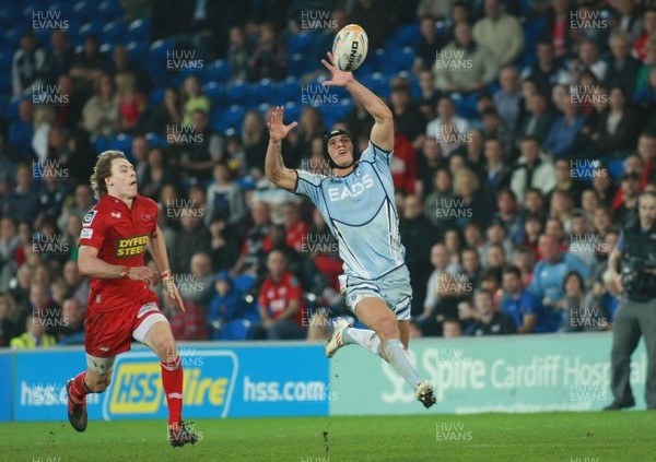 240312 Cardiff Blues v Scarlets - RaboDirect PRO 12 -Blues' Tom James juggles with a high ball