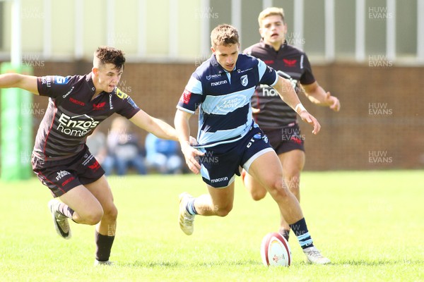 250818 - Cardiff Blues A v Scarlets A - Pre Season Friendly -  Cam Lewis of Cardiff Blues A and Tom Rogers of Scarlets A compete for a loose ball 