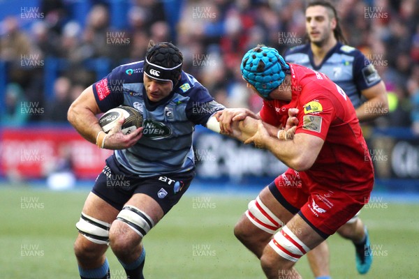 311217 - Cardiff Blues v Scarlets - GuinnessPro14 - George Earle of Cardiff Blues takes on Tadhg Beirne of Scarlets
