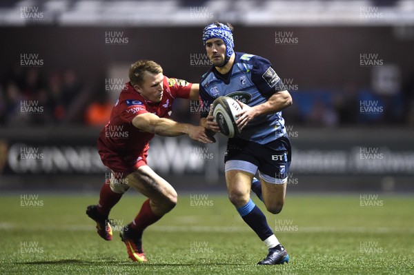 311217 - Cardiff Blues v Scarlets - Guinness PRO14 - Matthew Morgan of Cardiff Blues gets past Tom Prydie of Scarlets