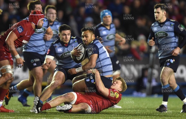 311217 - Cardiff Blues v Scarlets - Guinness PRO14 - Willis Halaholo of Cardiff Blues is tackled by James Davies of Scarlets