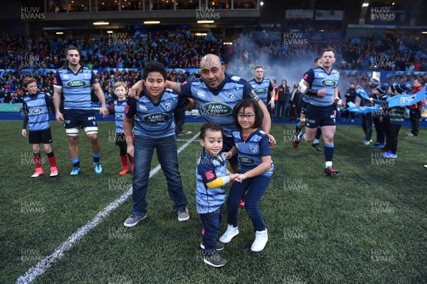 311217 - Cardiff Blues v Scarlets - Guinness PRO14 - Taufa'ao Filise of Cardiff Blues leads out his side on his 250th game with his family