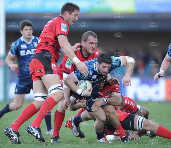 211012 - Cardiff Blues v Toulon - Heineken Cup -Alex Cuthbert of Cardiff Blues is tackled by Gethin Jenkins and Juan Martin Fernandez Lobbe of Toulon