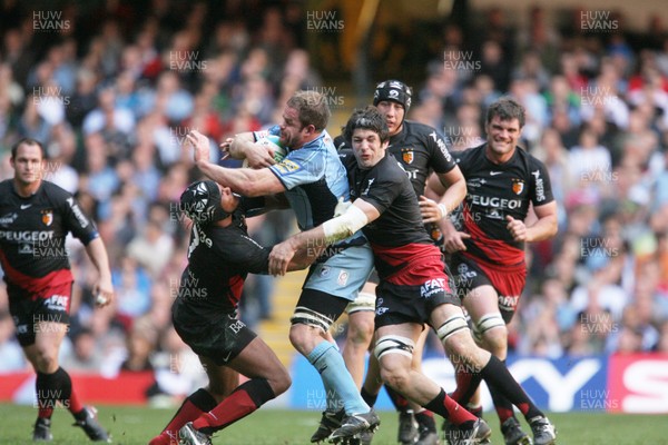 11.04.09 Cardiff v Toulouse... Xavier Rush hands off Thierry Dusautior. 