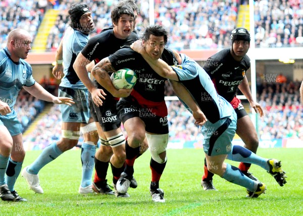 11.04.09 - Heineken Cup Rugby Quarter Final -  Cardiff Blues v Toulouse Byron Kelleher of Toulouse is tackled by Cardiff Blues' Martyn Williams 