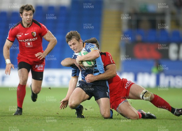 12.12.09  Cardiff Blues v Toulouse Blues' Ben Blair is tackled by Toulouse's Florian Fritz. 