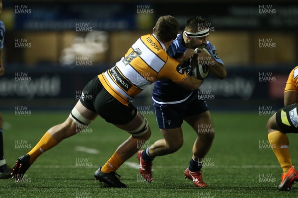 091119 - Cardiff Blues v Toyota Cheetahs - Guinness PRO14 - Liam Belcher of Cardiff Blues is tackled by Jasper Wiese of Cheetahs