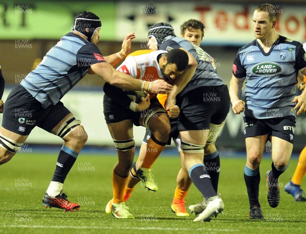 100218 - Cardiff Blues v Toyota Cheetahs - Guinness PRO14 - Uzair Cassiem of Toyota Cheetahs is tackled by George Earle of Cardiff Blues and Seb Davies of Cardiff Blues