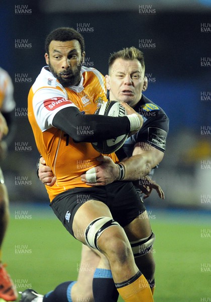 100218 - Cardiff Blues v Toyota Cheetahs - Guinness PRO14 - Uzair Cassiem of Toyota Cheetahs is tackled by Matthew Rees of Cardiff Blues