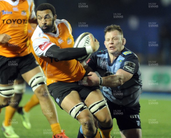 100218 - Cardiff Blues v Toyota Cheetahs - Guinness PRO14 - Uzair Cassiem of Toyota Cheetahs is tackled by Matthew Rees of Cardiff Blues