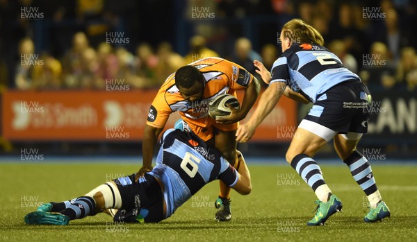 280918 - Cardiff Blues v Cheetahs - Guinness PRO14 - Ox Nche of Cheetahs is tackled by Olly Robinson and Kristian Dacey of Cardiff Blues